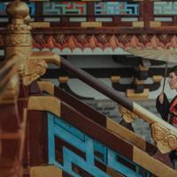 妈妈把我扶上自行车