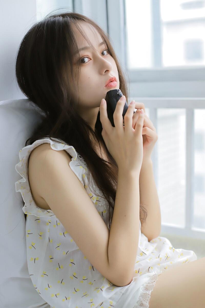 站在阳光下等你